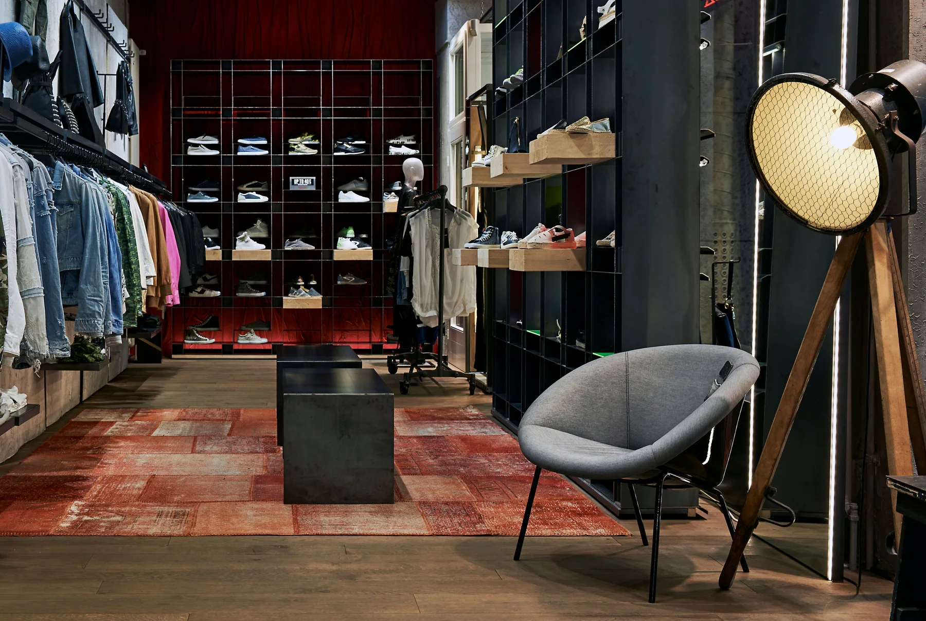 Clothing, footwear, and denim displayed inside a fashion store